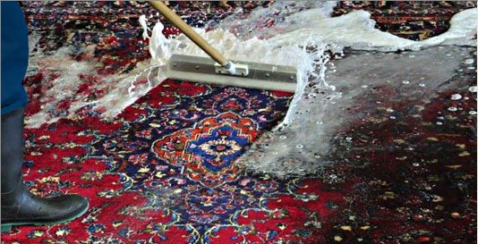 A rug being washed